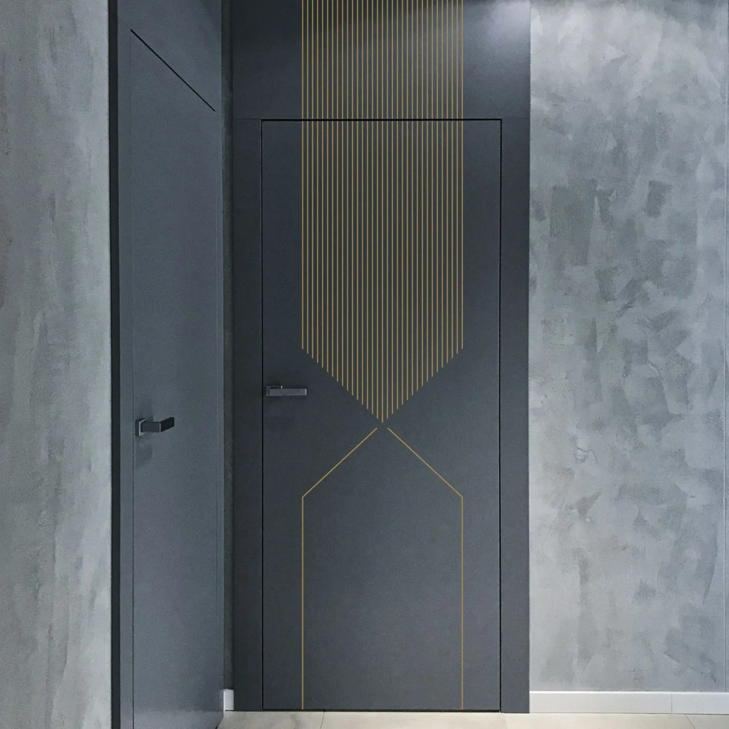 Geometria — a graphite door with gilded lines descending to a point